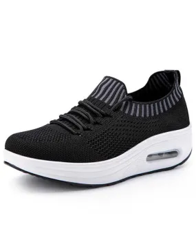 Black flyknit textured rocker bottom shoe sneaker