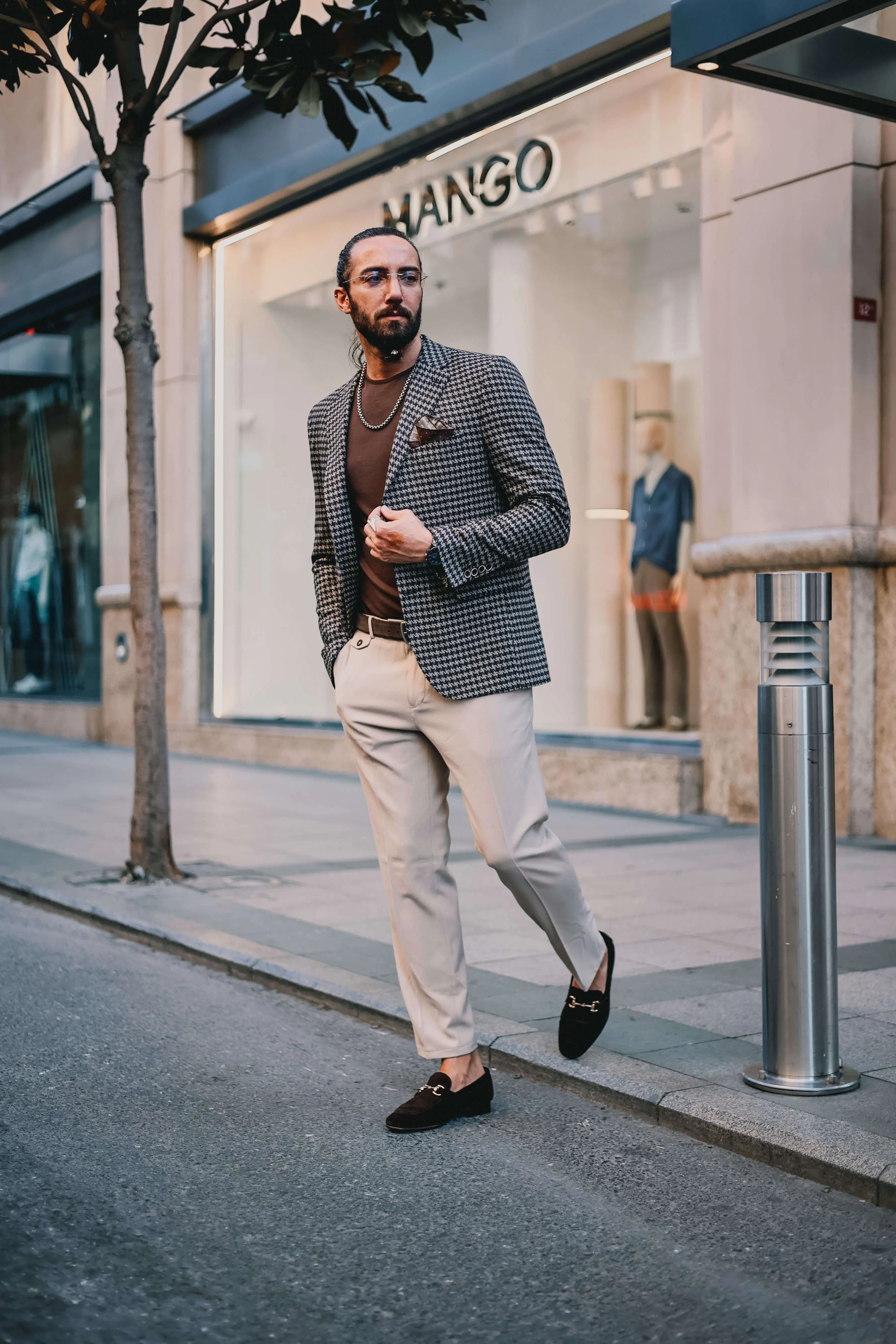 Charcoal houndstooth blazer.