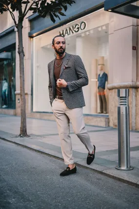 Charcoal houndstooth blazer.