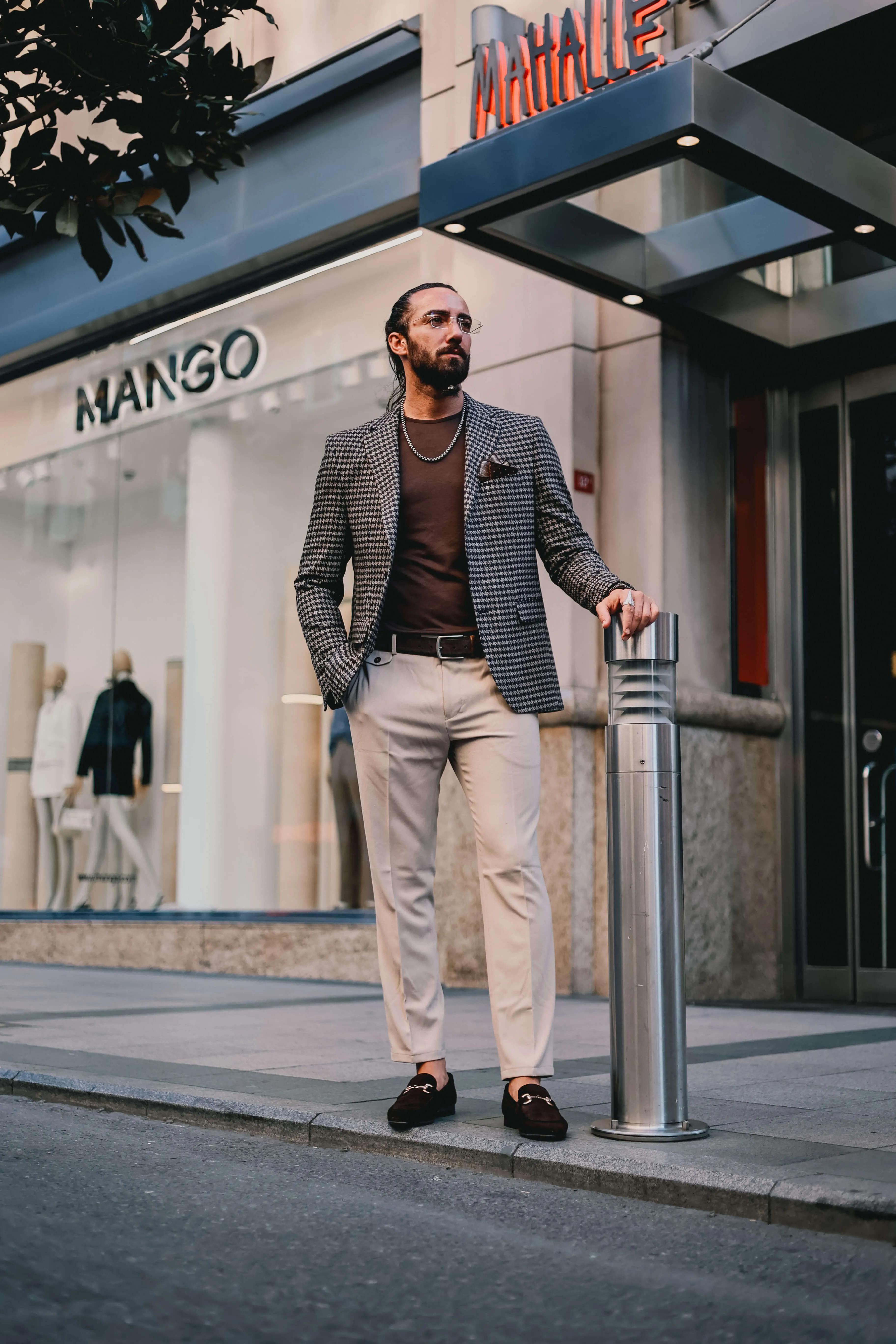 Charcoal houndstooth blazer.