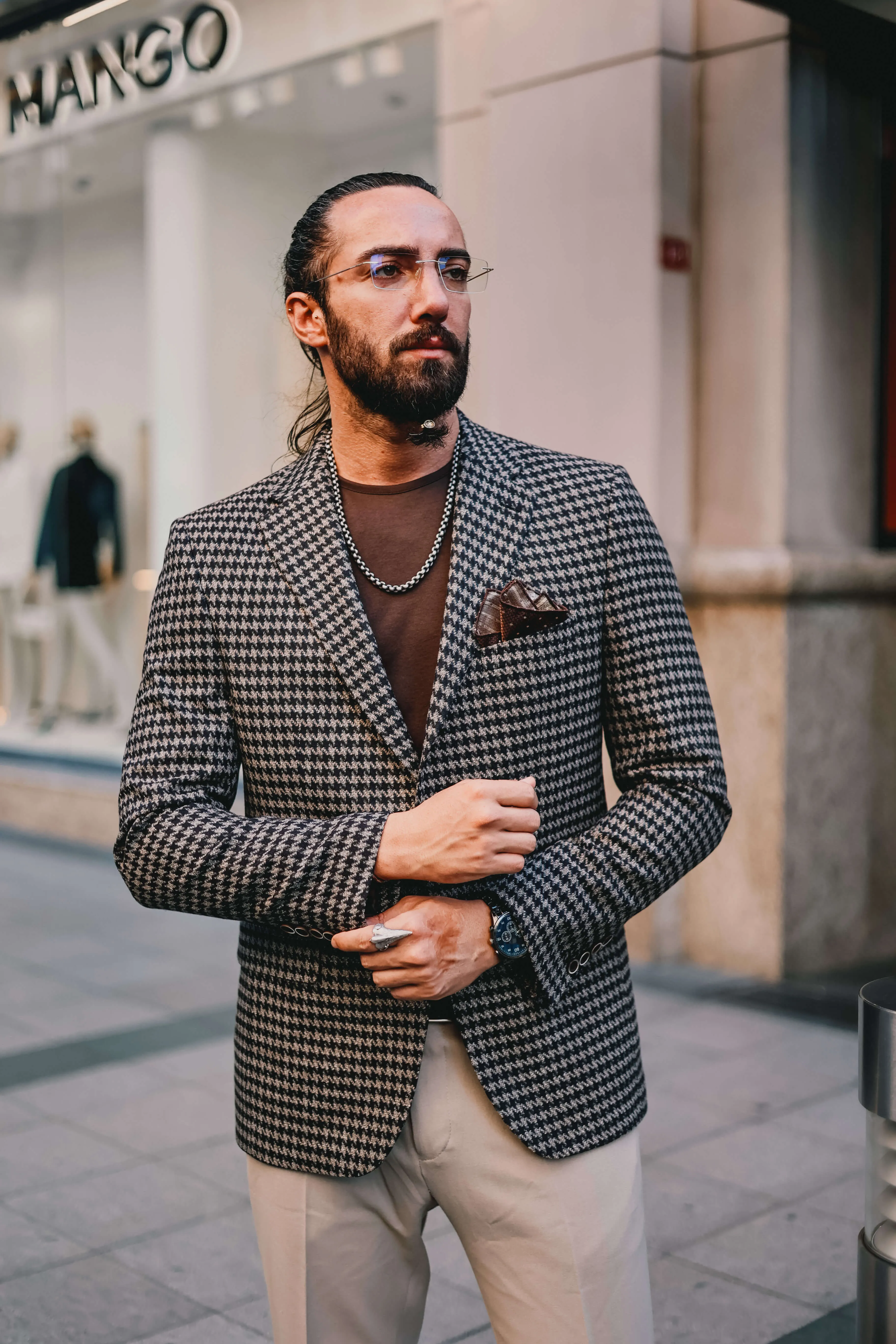 Charcoal houndstooth blazer.